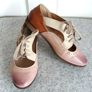 Brogue style shoes with cut outs in brown tan and lavender
